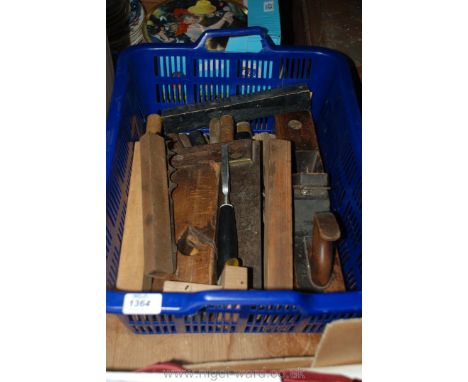 A quantity of old woodworking tools including spokeshaves, chisels, etc.
