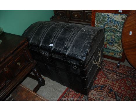 A lovely old domed top travelling Trunk. 36" x 22 1/2" x 30" high.