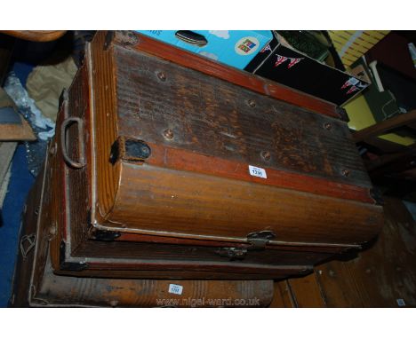 A tin Trunk with rippled finish, 26" long.