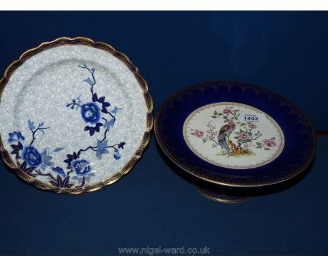 A Wedgwood Imperial porcelain mimosa ware cake stand along with a Royal Worcester cake plate.