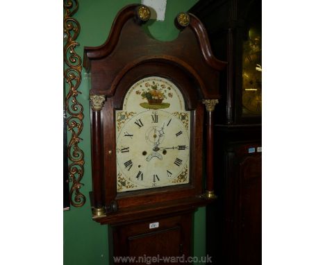 An unusually short Oak cased longcase Clock, having scroll pediment, the hood flanked by turned tapering pillars with brass C