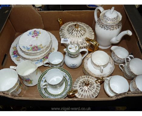 An Adderley gilt and white coffee set, a Sadler teapot and sugar bowl, a Limoges coffee pot, two coffee cups and saucers and 