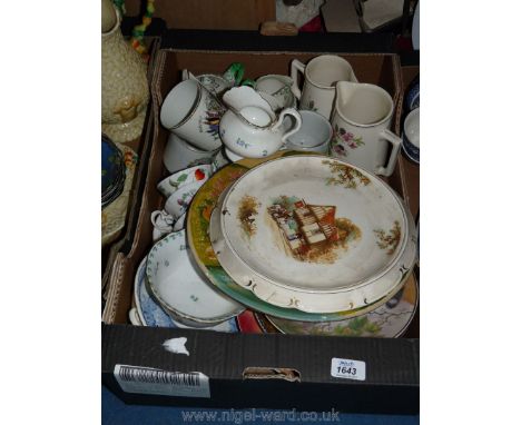 A quantity of miscellaneous china including three commemorative mugs, cups, saucers, display plates, etc.