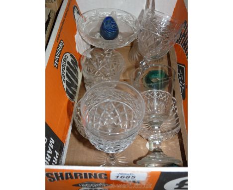 A small quantity of glass including three wine glasses, a whiskey glass, bell, bon bon dish, a bluebird paperweight, two salt