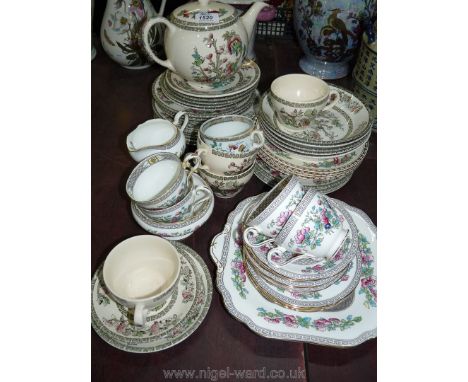 A quantity of old and modern Indian tree pattern china plates, dishes, cup, saucers and a teapot, etc.