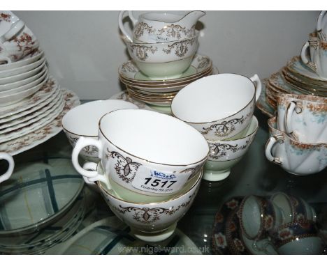 A Royal Vale part Teaset including five cups, a bread and butter plate, six tea plates, seven saucers, a milk jug and sugar b