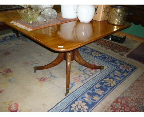 A good 19th c. snap top Breakfast Table, the rectangular curved cornered top 48" x 42" supported on a turned pillar with four