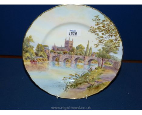 A hand painted Royal Worcester plate, Hereford Cathedral signed M. Henry.