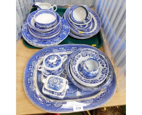 A group of blue and white wares, to include a Willow pattern meat plate (AF), Alfred Meakin sugar bowl, dinner plates, two ha