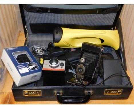 A Karcher steam window cleaner WV50, a Polaroid colour pack 80 land camera, Kodak number 2 folding autographic Brownie camera