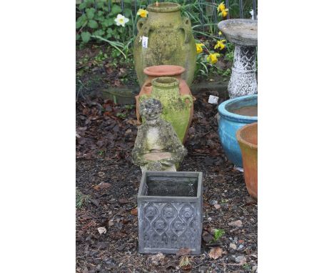TWO CLAY GARDEN EWERS, a terracotta planter, a composite figure of a boy and a lead look planter (5)