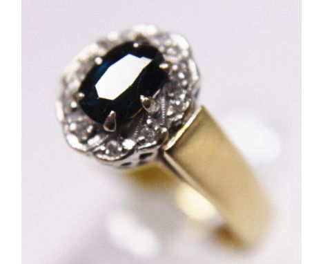 18ct gold royal blue sapphire and diamond ring approximately 1.00ct, size Q/R