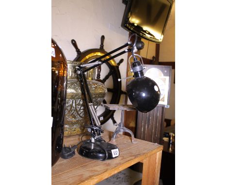 Black and chrome anglepoise lamp