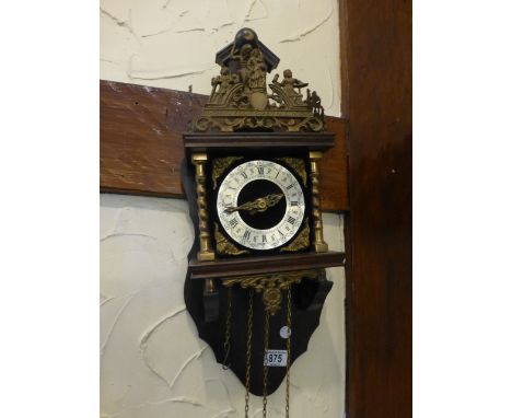 Mahogany wall hanging clock, weights in office