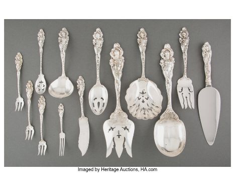 A Group of Thirteen Reed &amp; Barton&nbsp;Love Disarmed&nbsp;Pattern Silver Flatware Serving Pieces, Taunton, Massachusetts,