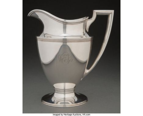 A Tiffany &amp; Co. Silver Water Pitcher, New York, 1947-1956Marks: TIFFANY &amp; CO., MAKERS, STERLING SILVER, 18181, M9-1/4