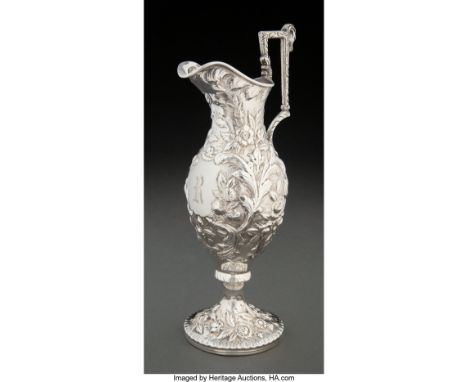 A Kirk & Sons Coin Silver Chased Repoussé Cream Pitcher, Baltimore, Maryland, circa 1875 Marks: KIRK & SON, 11OZ 10-1/2 x 4-1