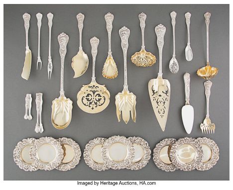 A Group of Twenty-Six Tiffany &amp; Co.&nbsp;Olympian&nbsp;Pattern Partial Gilt Silver Flatware Serving Pieces, New York, des