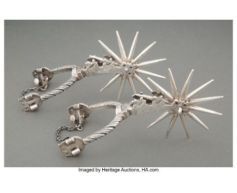 A Pair of William Spratling Silver Spurs, Taxco, Mexico, circa 1950Marks: WS, 9258-1/2 x 5 x 4-3/4 inches (21.6 x 12.7 x 12.1