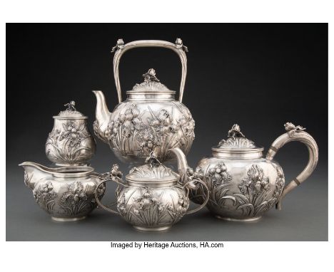 A Five-Piece Samurai Shokai Silver&nbsp;Irises&nbsp;Tea Service, Yokohama, Japan, early 20th centuryMarks: SAMURAI SHOKAI, YO