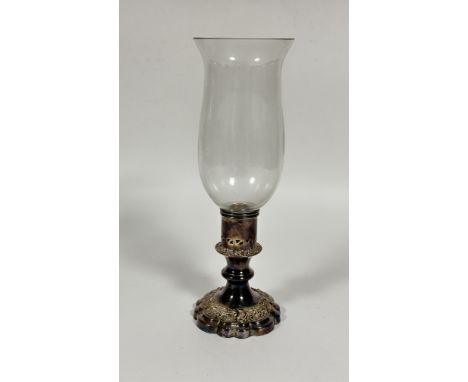 An Epns circular column storm lamp with chased scalloped base complete with glass shade, (H x 34 cm x D x 10.5)&nbsp;