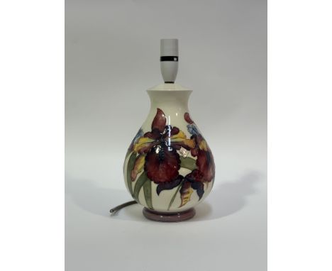 A Moorcroft baluster shaped table lamp decorated with red irises (marked verso) (h-32.5cm)&nbsp;