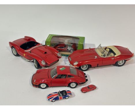 A Burago red Jaguar E type soft top die cast 1/18 model car, a red Ferrari 250 Testa Rossa 1957 die cast&nbsp; 1/18 model car