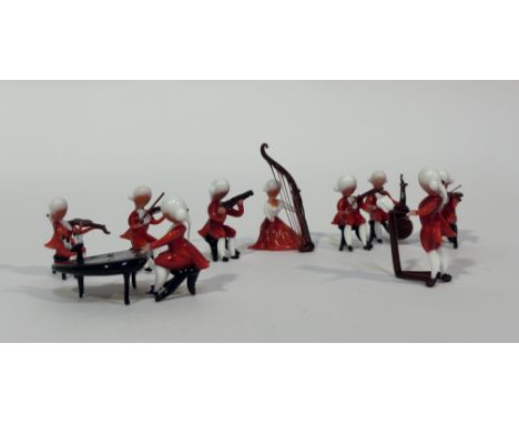 A Murano glass Orchestra Musicians miniatures comprising, the conductor, a pianist, four violinists, a cellist, a harp player