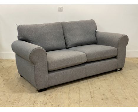A modern grey two seater sofa with squab cushions raised on square tapered supports&nbsp;&nbsp;