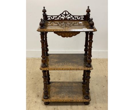 A Victorian burr and figured walnut three tier what not, the top with pierced gallery, and each shelf with marquetry and Tunb