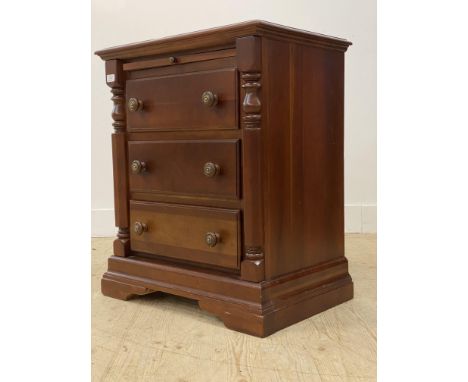 A stained cherry chest, fitted with three drawers enclosed by split pilasters, raised on bracket supports. H78cm, W66cm, D45c