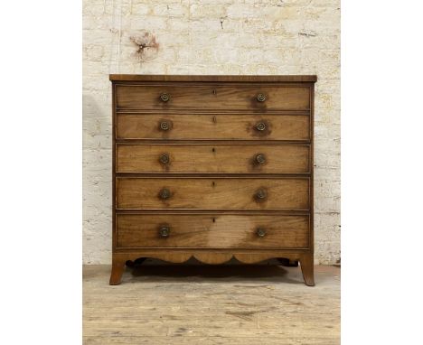 A George III mahogany inlaid secretaire chest, the cross banded top above a pull out drawer with fitted interior and three gr