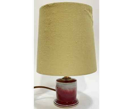 John Maguire for Strathearn Pottery, a sang de boef glazed lamp with khaki linen/canvass shade (height including shade- 26.5c