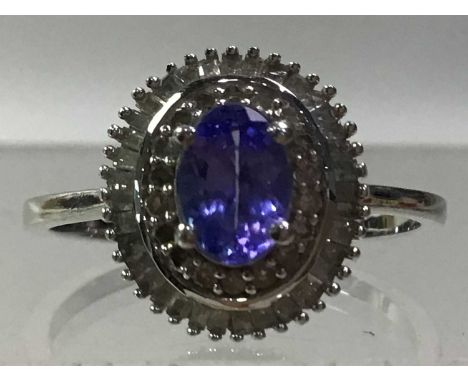 EIGHT TANZANITE RINGS  in silver  the gilt ring appears to be in good condition with no major noticeable damage. All rings ma