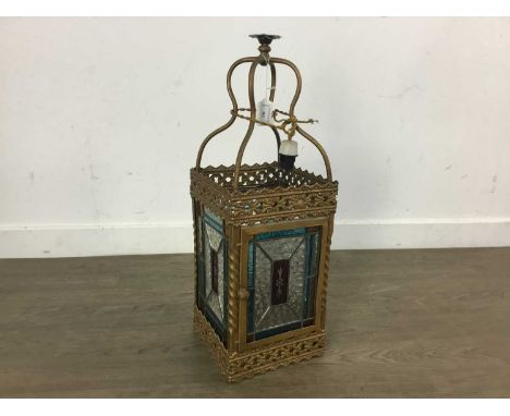 VICTORIAN HALL LANTERN, gilt metal with stained and leaded glass sides60cm highGlass panels slightly bowed, metal gallery sli