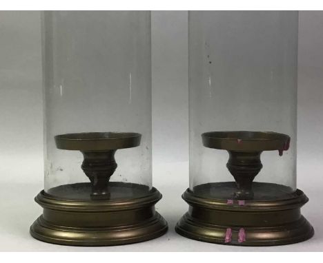 PAIR OF BRASS CANDLEHOLDERS, AND OTHER ITEMS the candleholders with brass topped glass sleeves, along with an onyx vase, thre