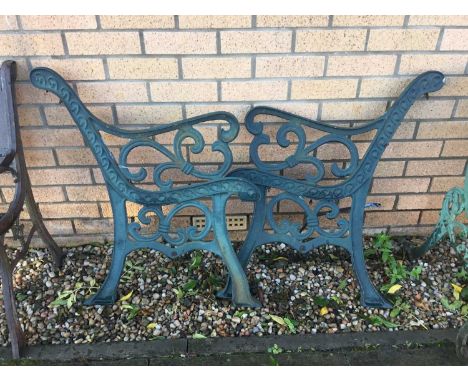 PAIR OF CAST IRON BENCH ENDS, scroll design77cm high