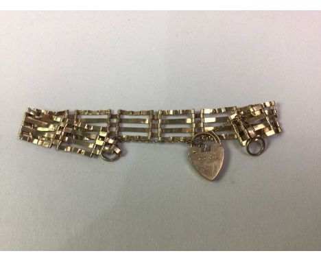 NINE CARAT YELLOW GOLD GATE BRACELET, AND TWO NINE CARAT GOLD CHAINS the bracelet with heart clasp, the chains both curb link