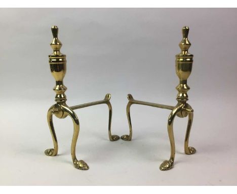 SET OF BRASS FIRE DOGS , AND FIRE TOOLS in the Regency style