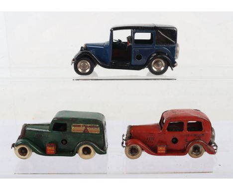 Tri-ang Minic 35M Taxi Cab, dark blue and black, good working condition, and two pre-war 2M Ford light vans, both fair green 