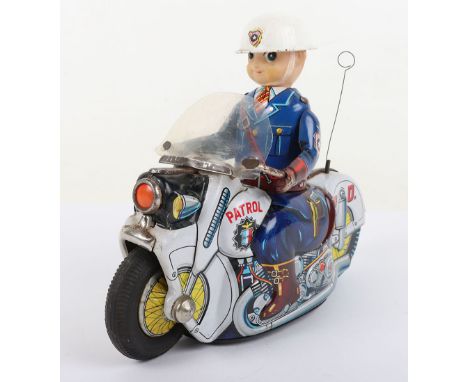 Usagiya (Japan) Police Patrol Motorcycle, lithographed tinplate motorcycle, motorcyclist has rubber head and front rubber tyr