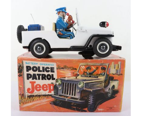 Boxed TN (Nomura) battery operated Police Patrol Jeep, white Jeep with seated Policemen, with mystery action, driver, buzzer 