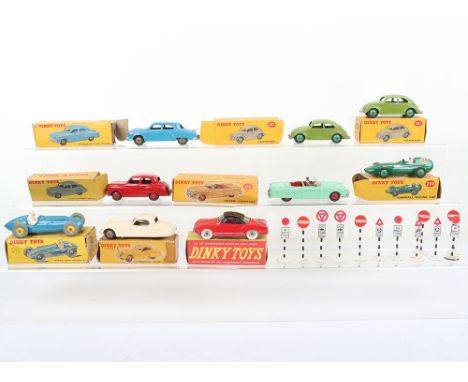 Nine Boxed Dinky Toys, including: 40j Austin Somerset, red body, 132 Packard Convertible, 157 Jaguar XK120 Coupe, white body,