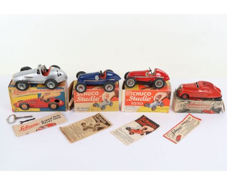 Three Vintage Boxed Boxed Schuco  Racing Cars,1050 Studio red body, with leaflet, 1050 Studio blue body, with two leaflets, 1