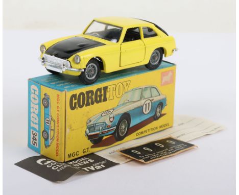 Vintage Corgi Toys 345 MGC GT Competition Model, yellow body/black bonnet/tailgate, black interior, spoked wheels, with suitc