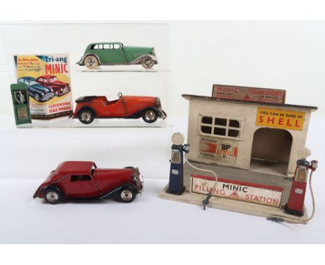 Three Tri-ang Minic Motor Cars, pre-war 5M Limousine, light green with luggage rack, 19M Vauxhall cabriolet, red, 17M Vauxhal