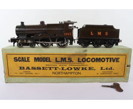 Bassett-Lowke 0 gauge clockwork 4-4-0 Compound locomotive and tender, 1063 engine and six wheel LMS tender, brown lined liver
