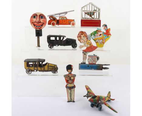German tinplate Penny/Novelty toys, Issmayer Bird In Cage,working clock work mechanism, Tinplate sedan, another Tinplate seda