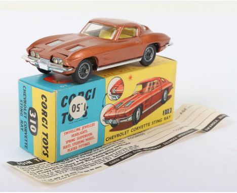 Scarce Vintage Corgi Toys 310 Chevrolet Corvette Sting Ray, metallic bronze body, yellow interior, spoked wheel hubs, in mint