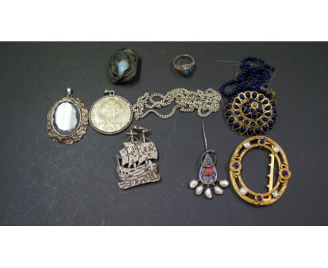 A large Austrian coin medallion on silver chain; together with silver ring set opal doublet; a cut glass cameo oval pendant; 